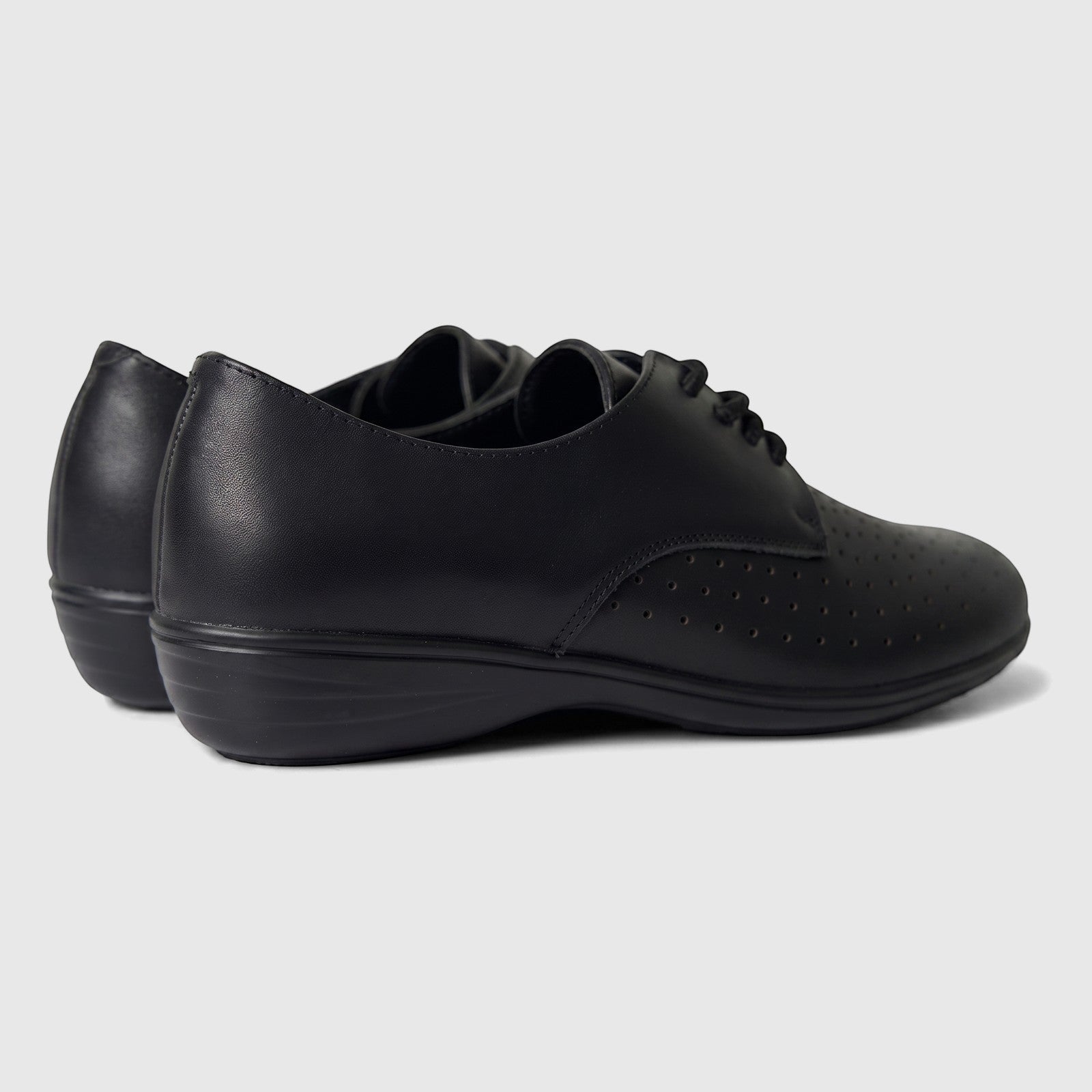 HP Ladies Comfort Lace Up HPL01499 Sister Black HL273 shoes, black, with perforated details and laces, viewed from the side.
