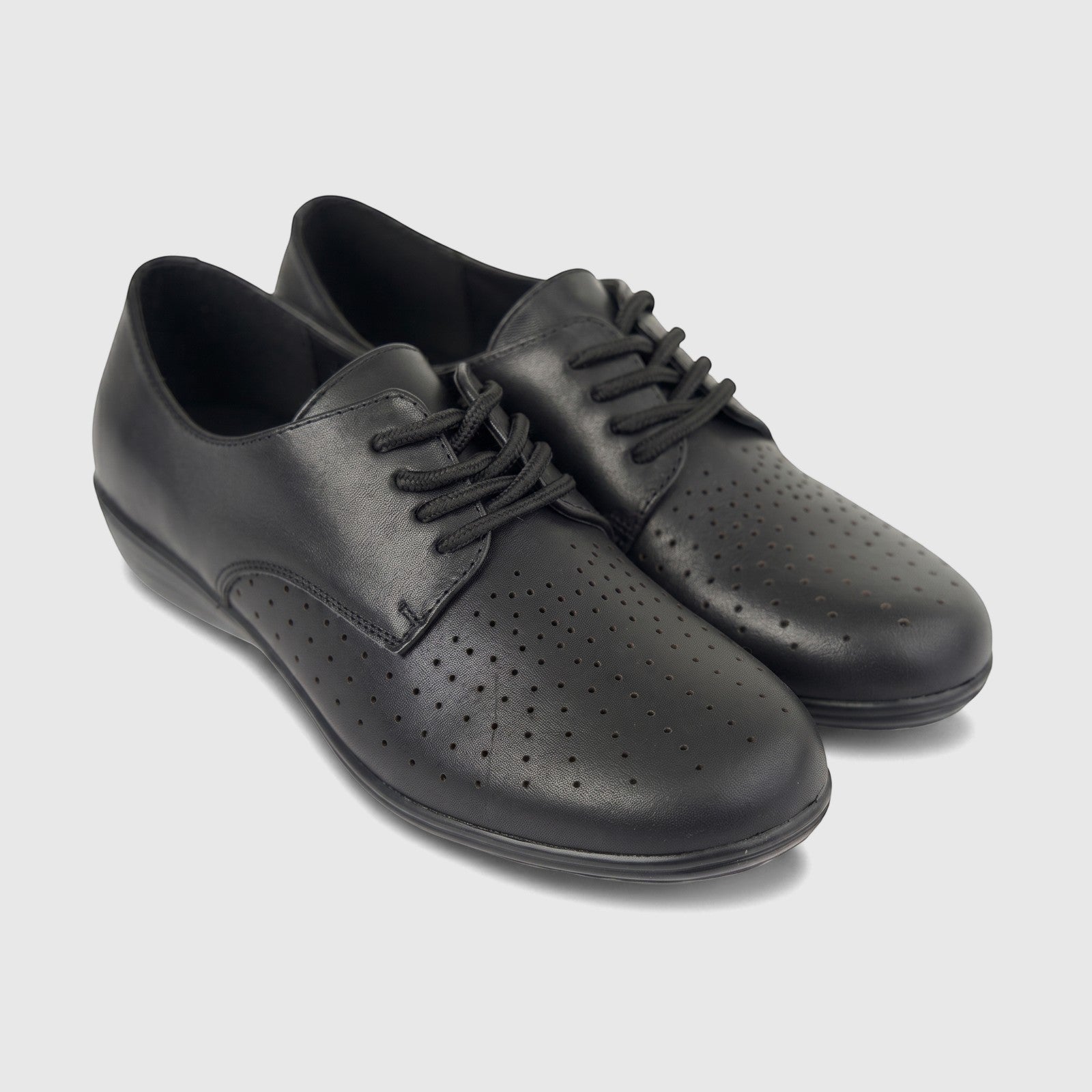 Pair of HP Ladies Comfort Lace Up HPL01499 Sister Black HL273 shoes made of black perforated leather, shown from a slightly