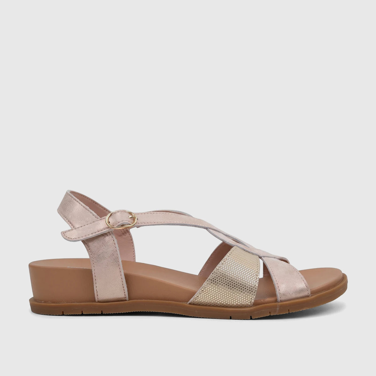 HP Ladies Comfort Sandal Baby Ines in pink metallic, featuring criss-cross straps, a gold buckle, and a comfortable brown
