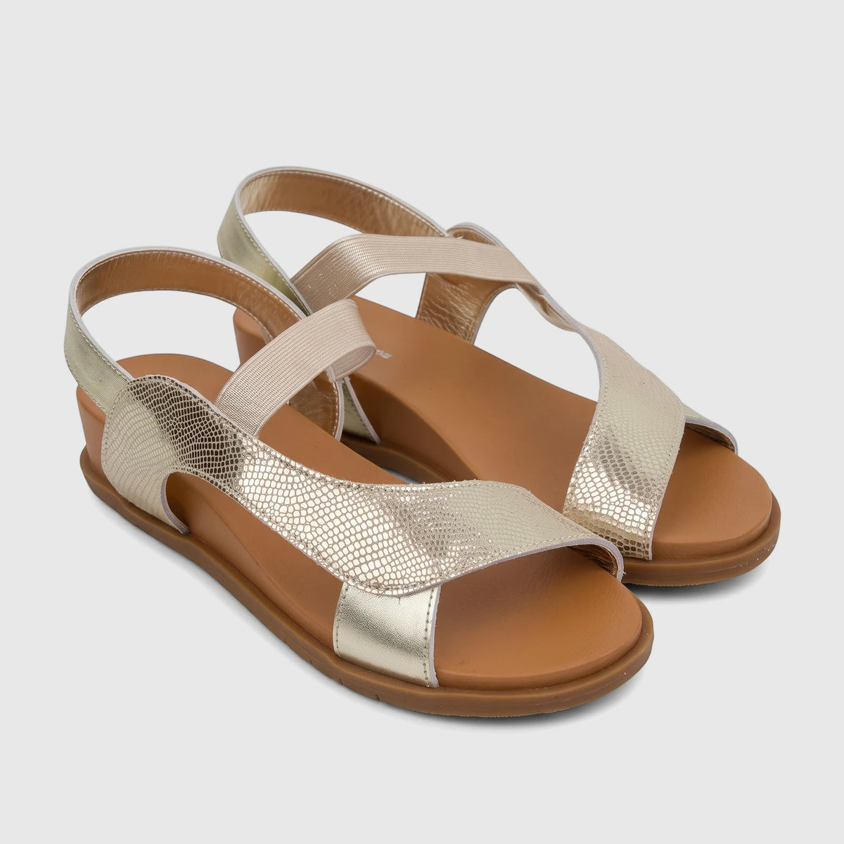 HP Ladies Comfort Sandal Zaira in gold metallic, featuring a snakeskin texture and elastic slingback straps, presented on a