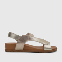 HP Ladies Comfort Sandal Zaira in gold metallic, featuring a snakeskin-textured upper and a comfortable brown wedge sole,