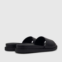 Two black HP Ladies Comfort slides, side-back view, featuring wide straps with visible stitching and thick soles.