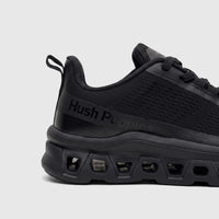 HP Ladies Comfort Sneaker Maxene in black, featuring a mesh upper, thick cushioned sole, and subtle branding.
