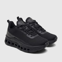 A pair of black HP Ladies Comfort Sneaker Maxene HPL01354 HL287, featuring knit uppers, prominent laces, and a chunky sole