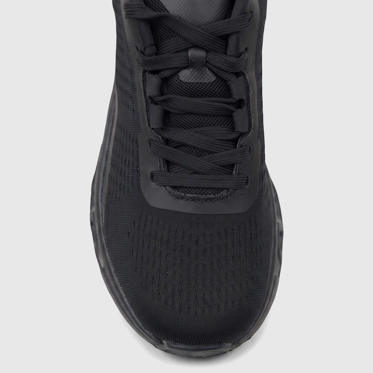 Front close-up view of a single black HP Ladies Comfort Sneaker Maxene featuring a mesh upper and black laces.