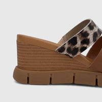 HP Ladies Comfort Wedge Sandal with brown leather straps, a stylish leopard print upper strap, and a textured brown wedge