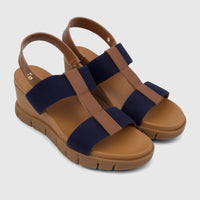 A pair of HP Ladies Comfort Wedge Sandals in navy blue and brown, featuring fabric straps and a comfortable wedge heel.
