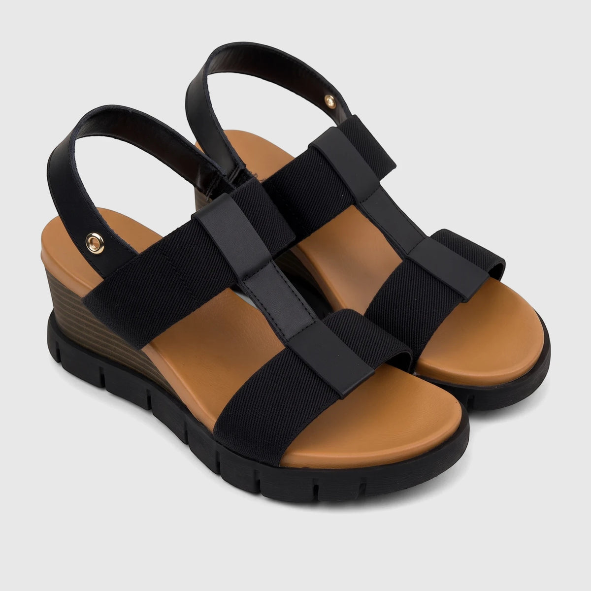 Pair of HP Ladies Comfort Wedge Sandals Nyx HPL01515 Black HL288, featuring black straps, a tan footbed, and a ridged black