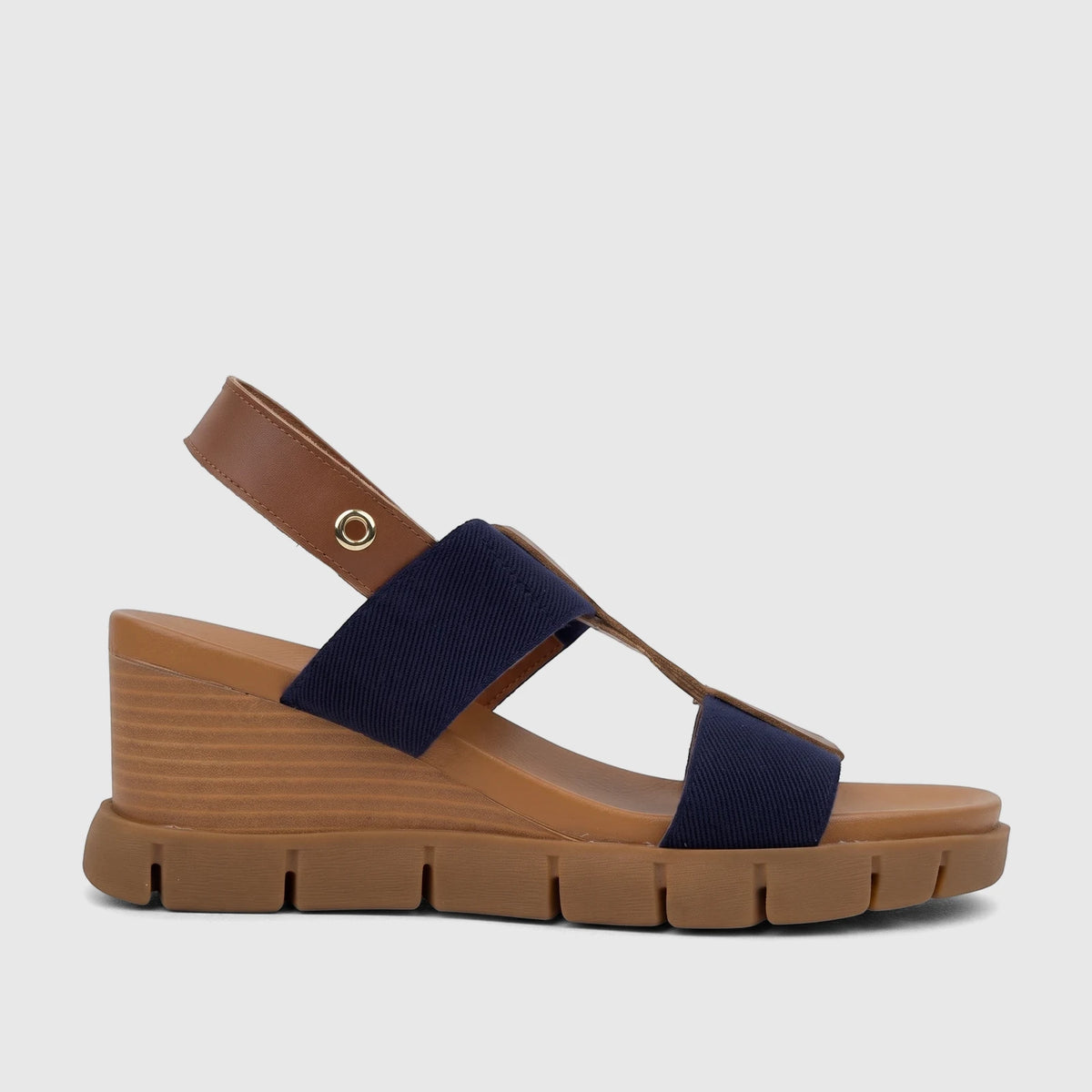 HP Ladies Comfort Wedge Sandal Nyx in navy and brown, featuring canvas straps and a textured wedge sole, side view.
