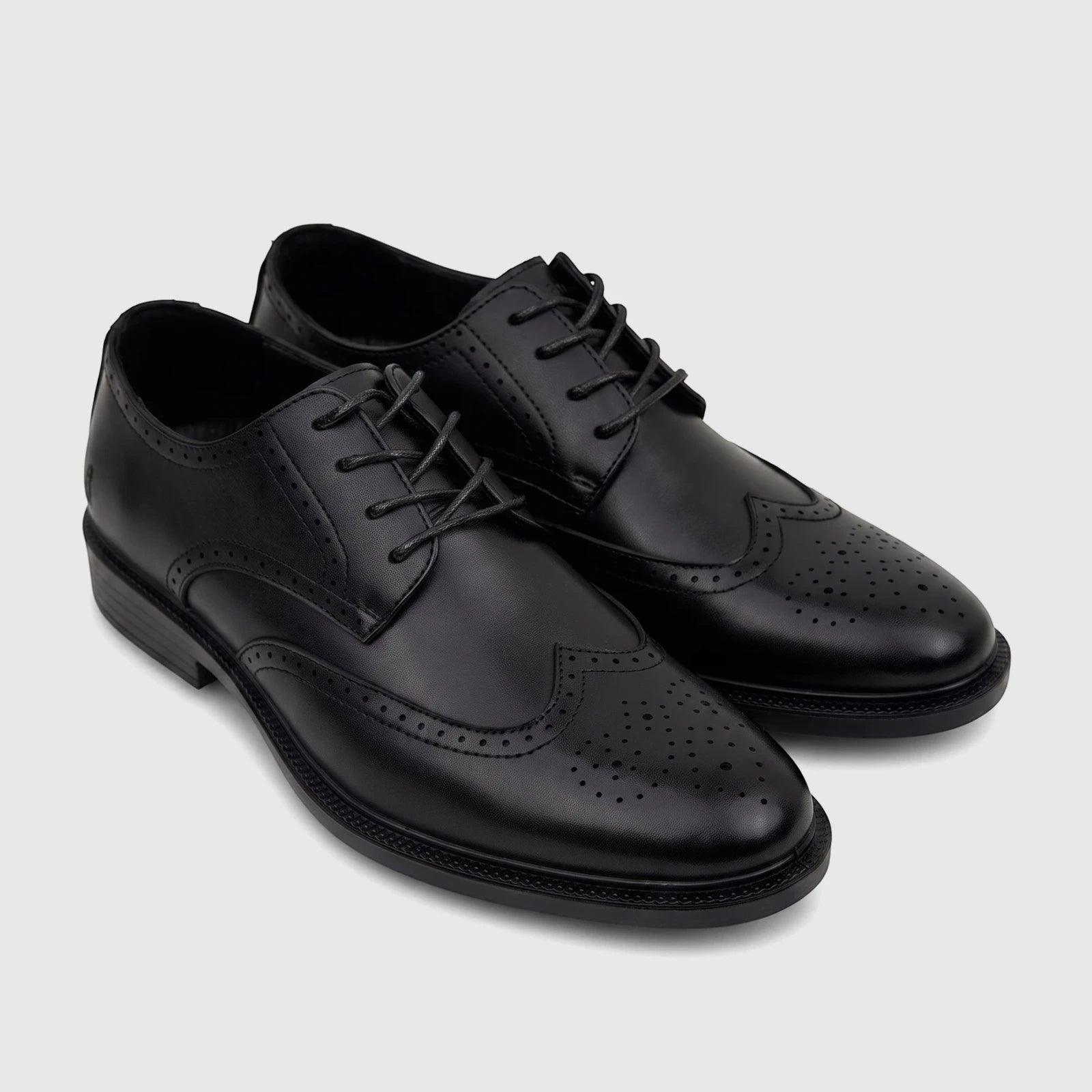 Black men's HP Alaric lace-up brogue dress shoes made of smooth leather material, displayed from an elevated angle.