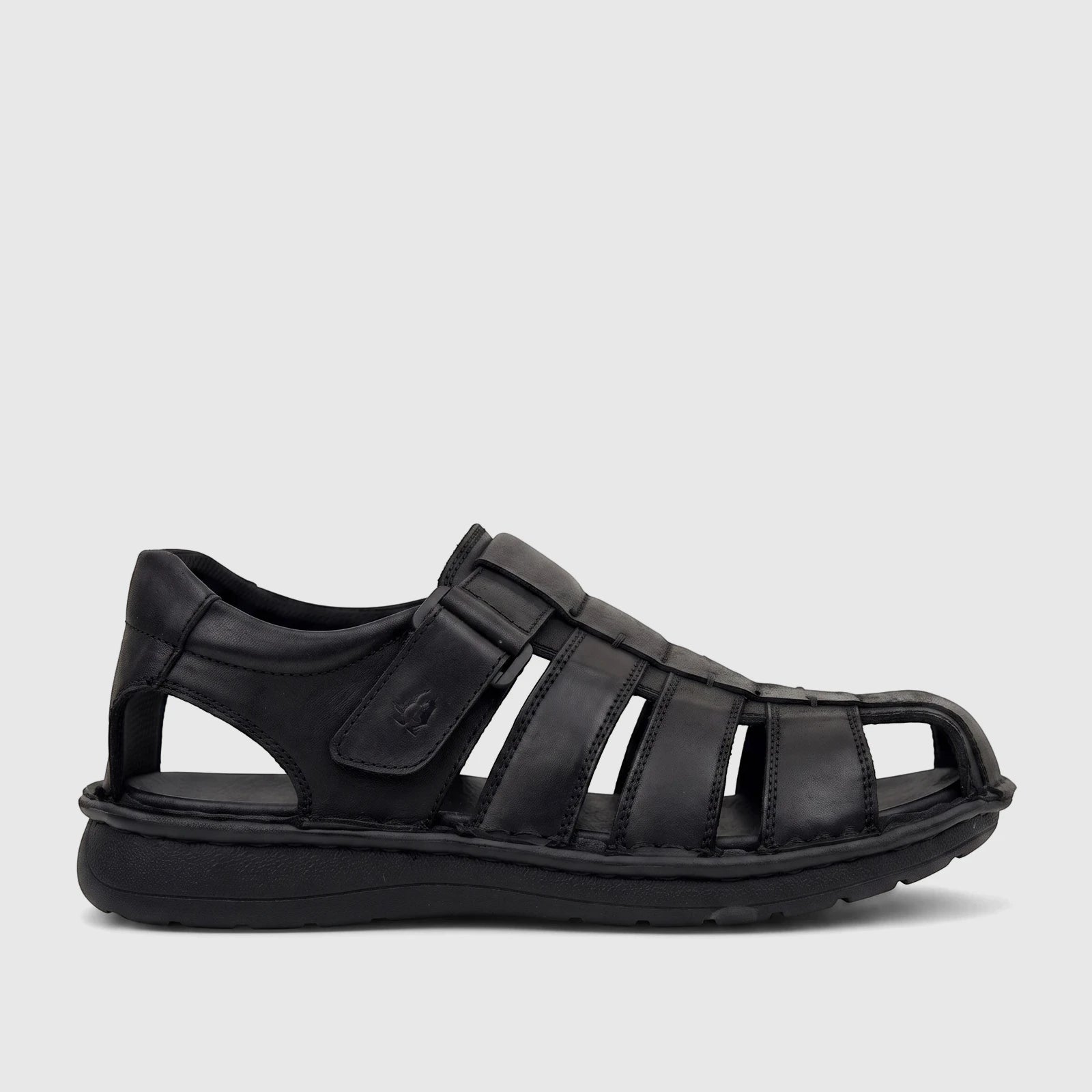 A black leather HP Men's Comfort Fisherman Sandal, seen from a side profile, showcasing its closed toe and strap details.