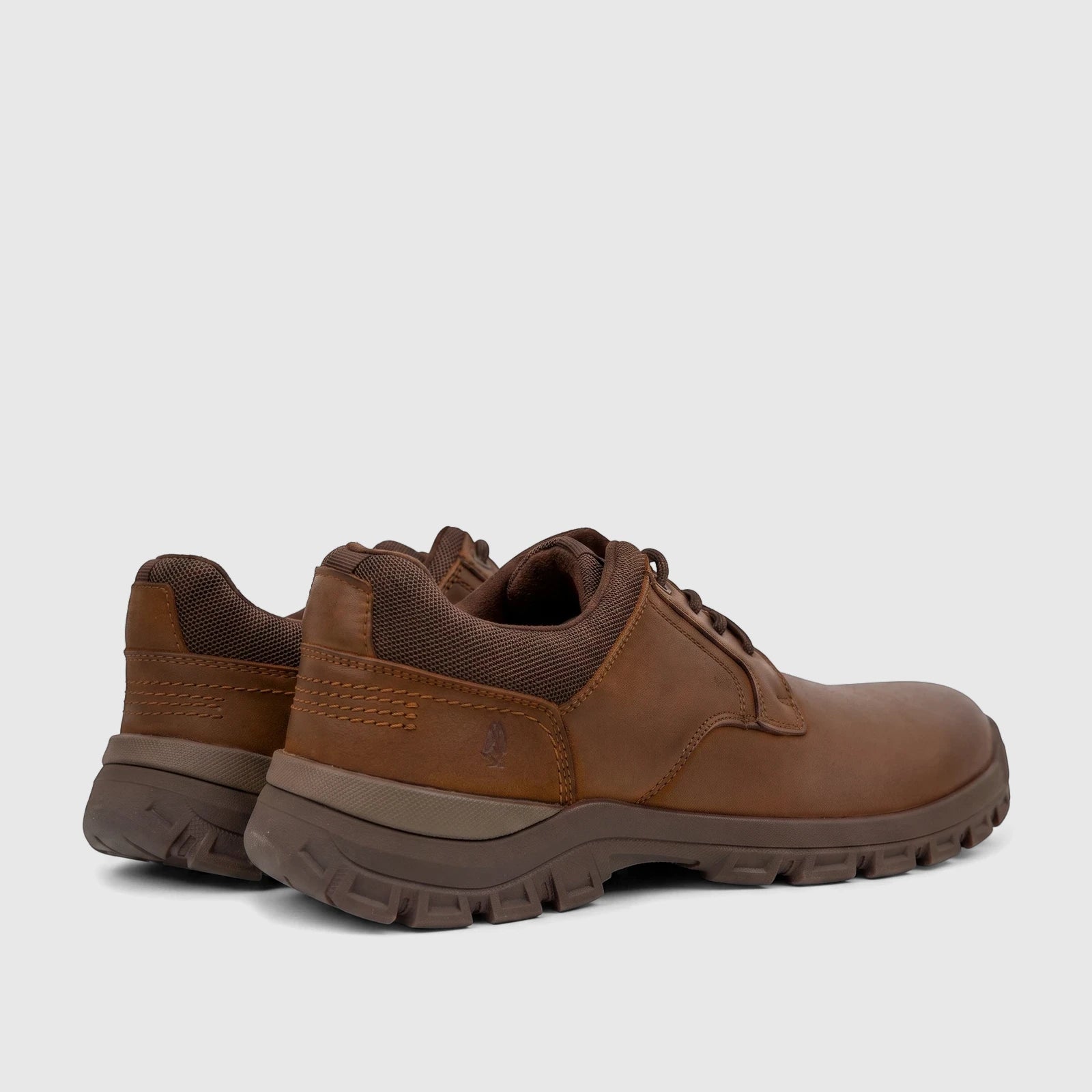 Men's HP Comfort lace-up shoes in brown leather, presented in a rear-side view showcasing the design and textured sole.