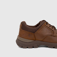 Brown HP Men's Comfort Lace Up Dawie shoe, featuring a sturdy multi-layered sole and intricate stitching, viewed from the