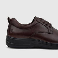 HP Men's Comfort Lace Up Stefan shoe in rich chocolate brown leather with a black sole, presented in a side profile view.