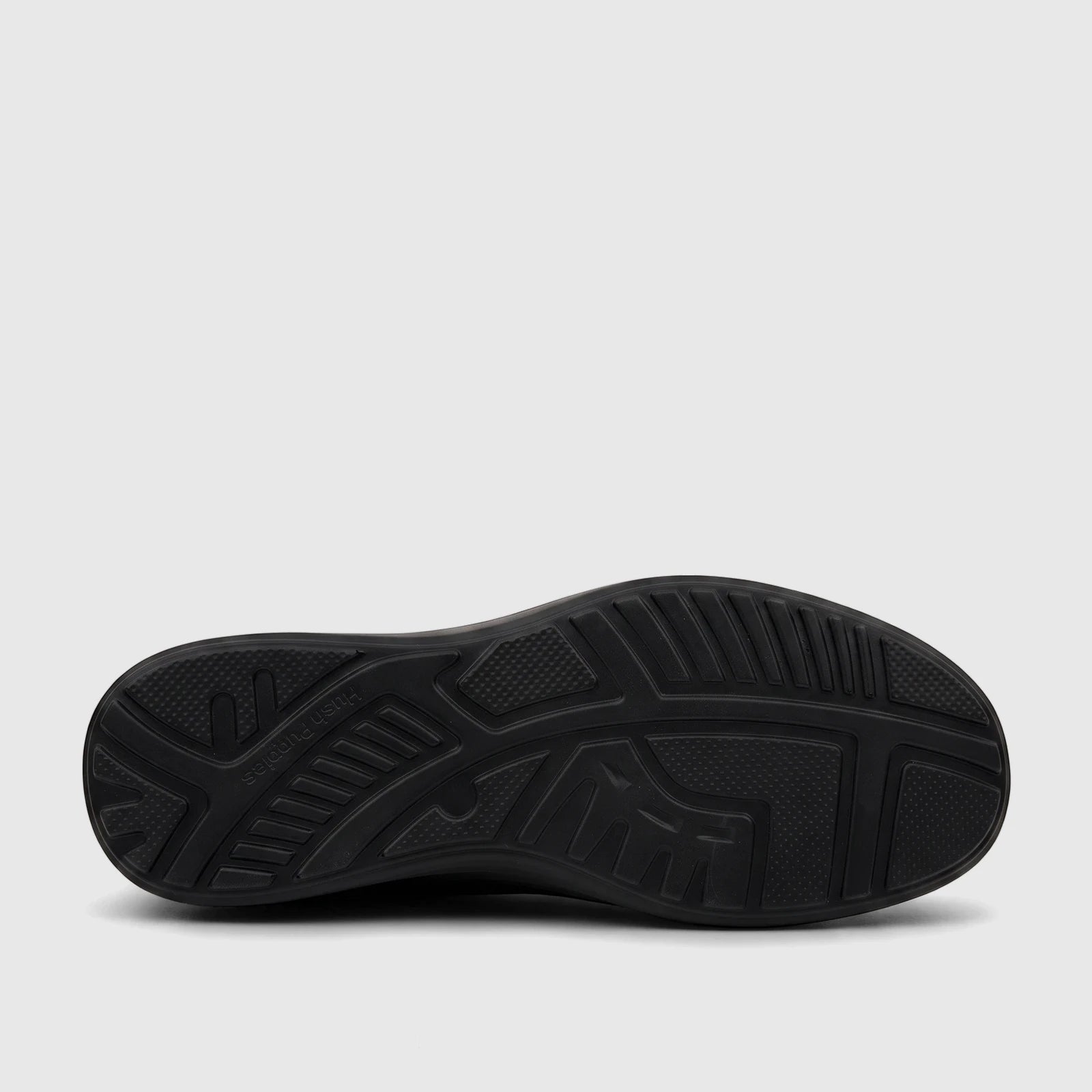 Bottom view of a black HP Men's Comfort Lace Up Stefan shoe, showing the textured sole with Hush Puppies branding.