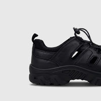 Side view of an HP Men's Comfort Sandal Elio HPM01054 in black, featuring a leather-like upper, bungee lacing, and a chunky