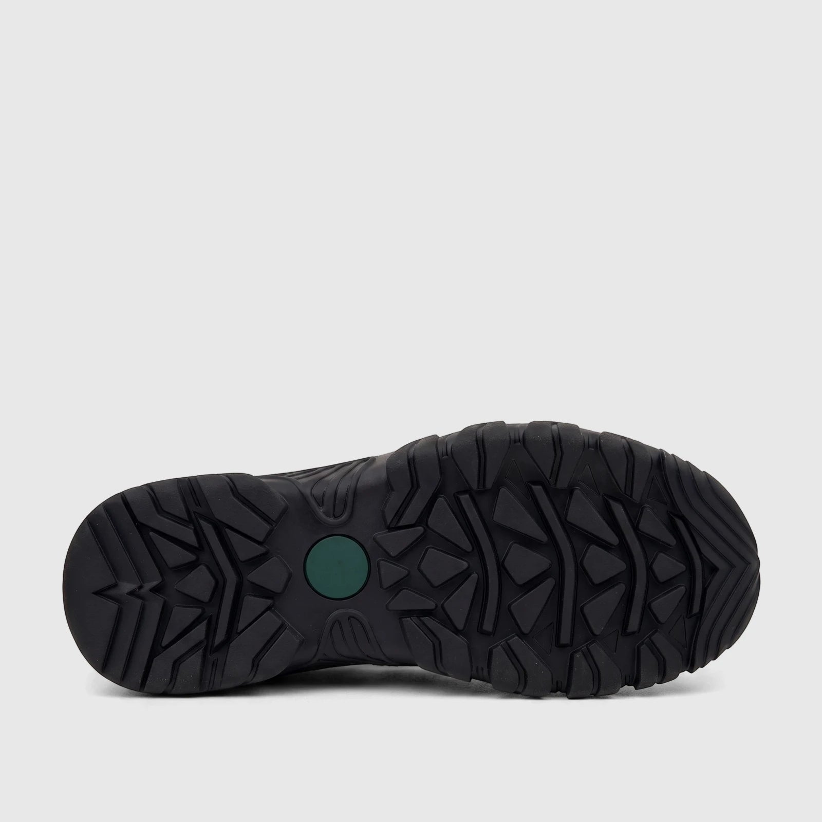 Black textured sole of an HP Men's Comfort Sandal, showing the durable tread and green circular detail.