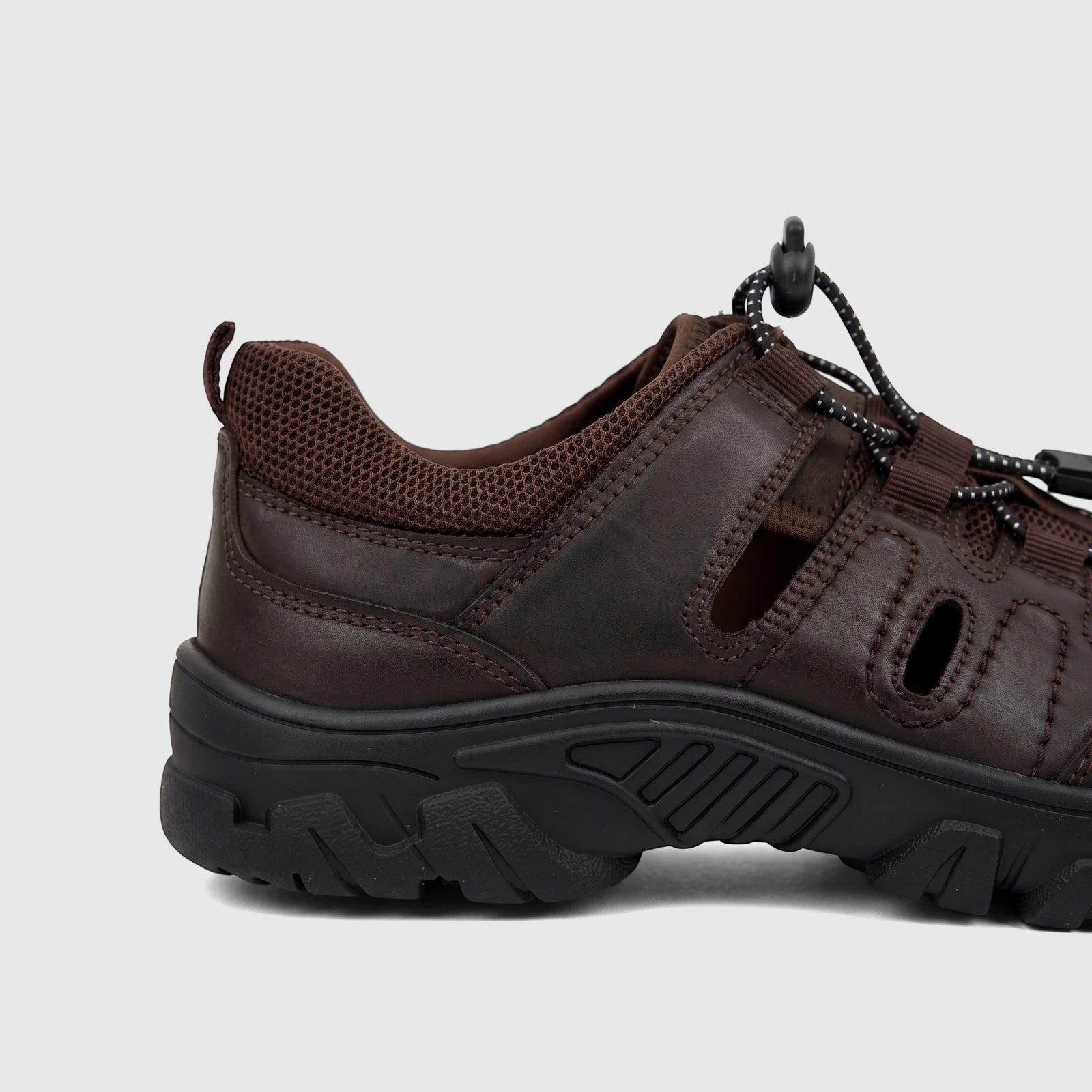Brown HP Men's Comfort Sandal Elio HPM01054 with a sturdy black sole and drawstring laces, shown in a side view.