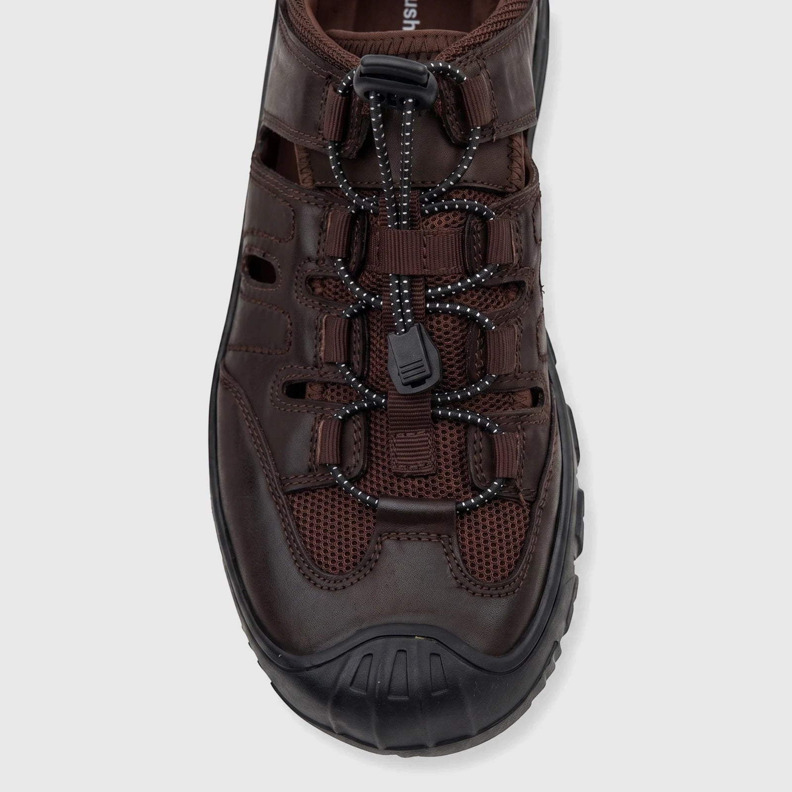 Close-up, top-down view of a brown HP Men's Comfort Sandal Elio HPM01054, featuring a leather and mesh upper with bungee