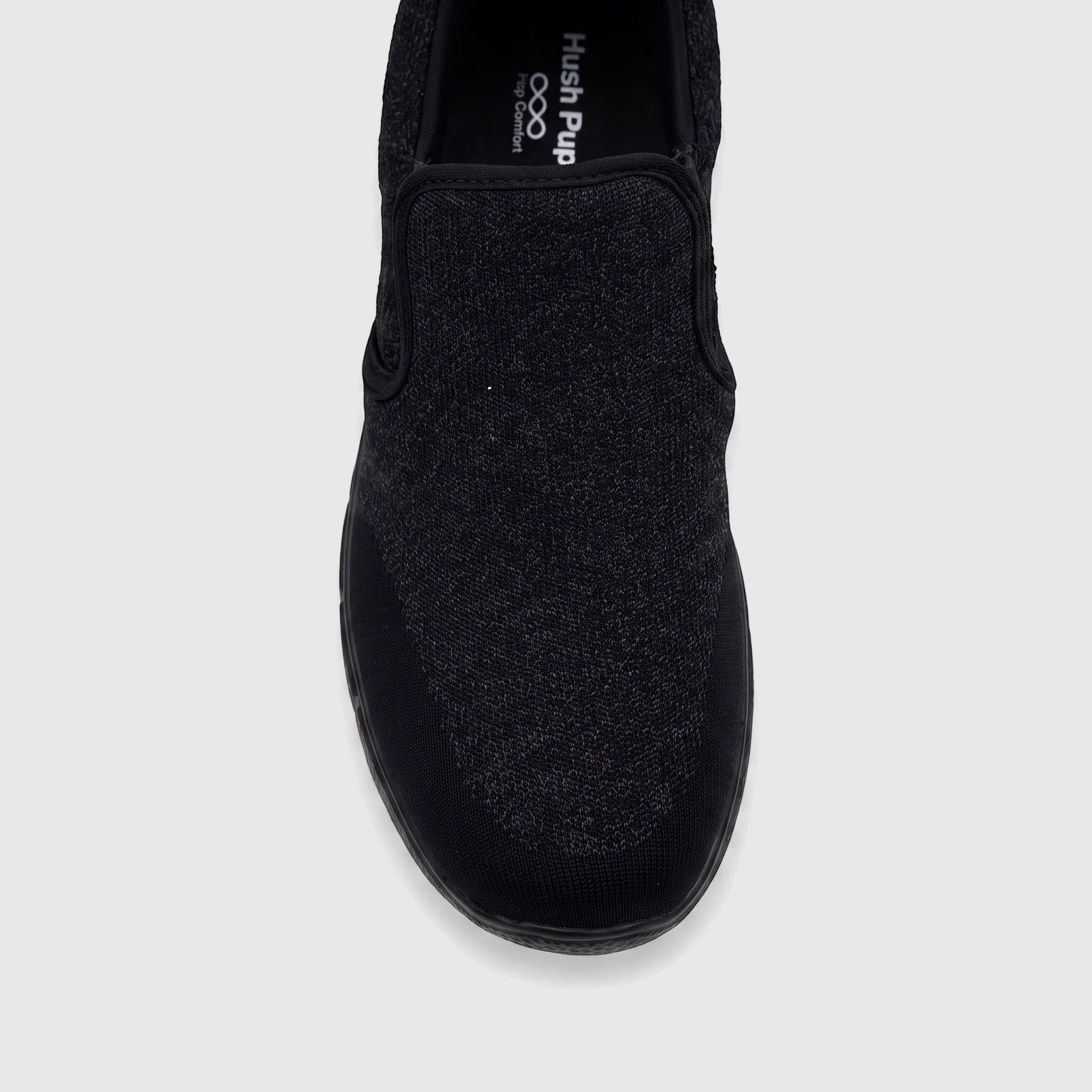 Black knit men's comfort slip-on sneaker, front view showing the textured upper and sturdy sole.