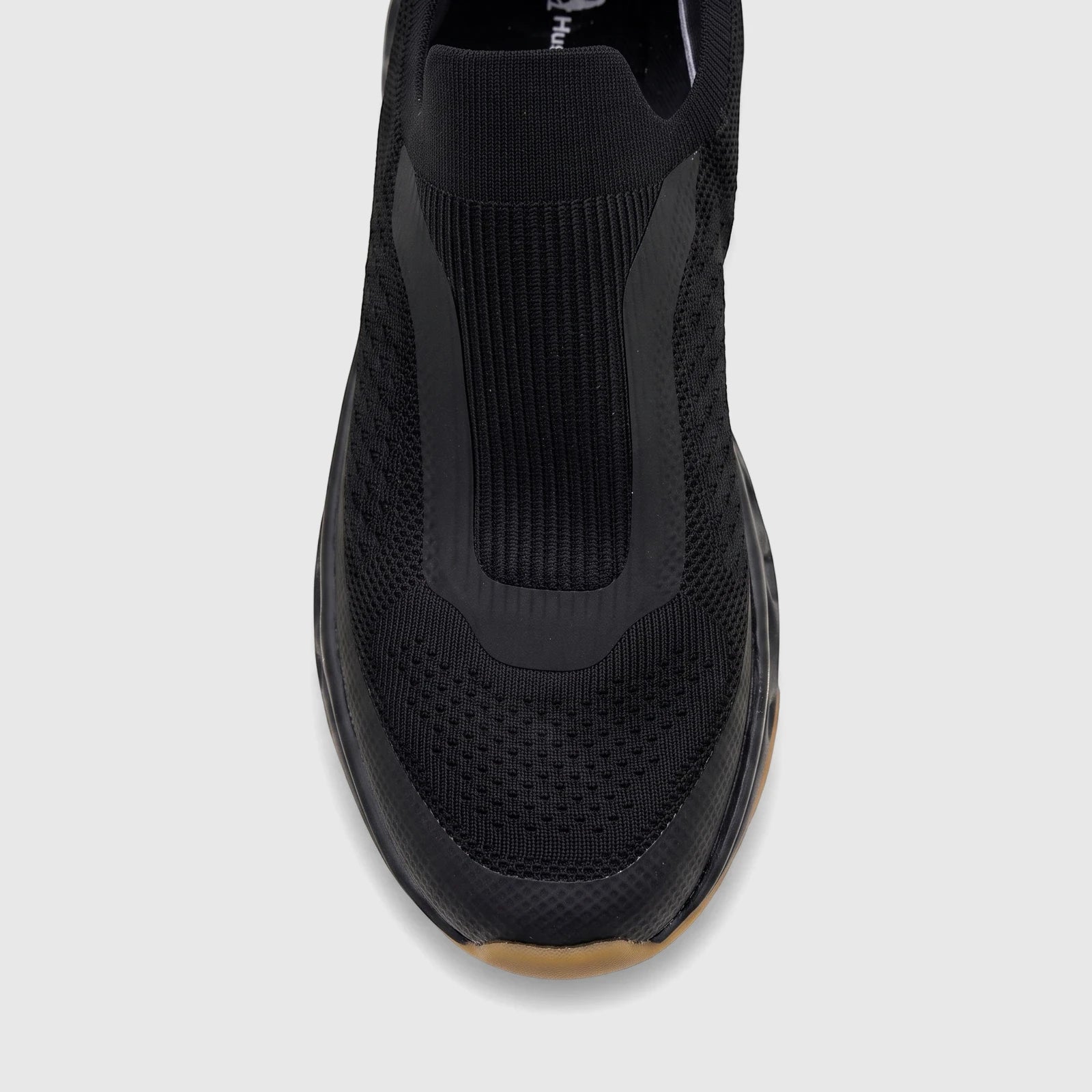 HP Men's Comfort Slip-On Sneaker Knoxx HPM01051 in black knit with a brown sole, viewed from directly above.