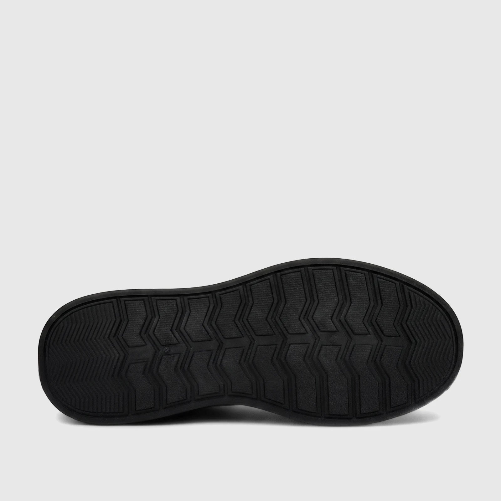 Black HP men's comfort sneaker sole, showcasing the distinctive chevron and zigzag tread pattern for optimal grip and style.