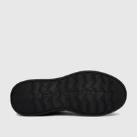 Black HP men's comfort sneaker sole, showcasing the distinctive chevron and zigzag tread pattern for optimal grip and style.