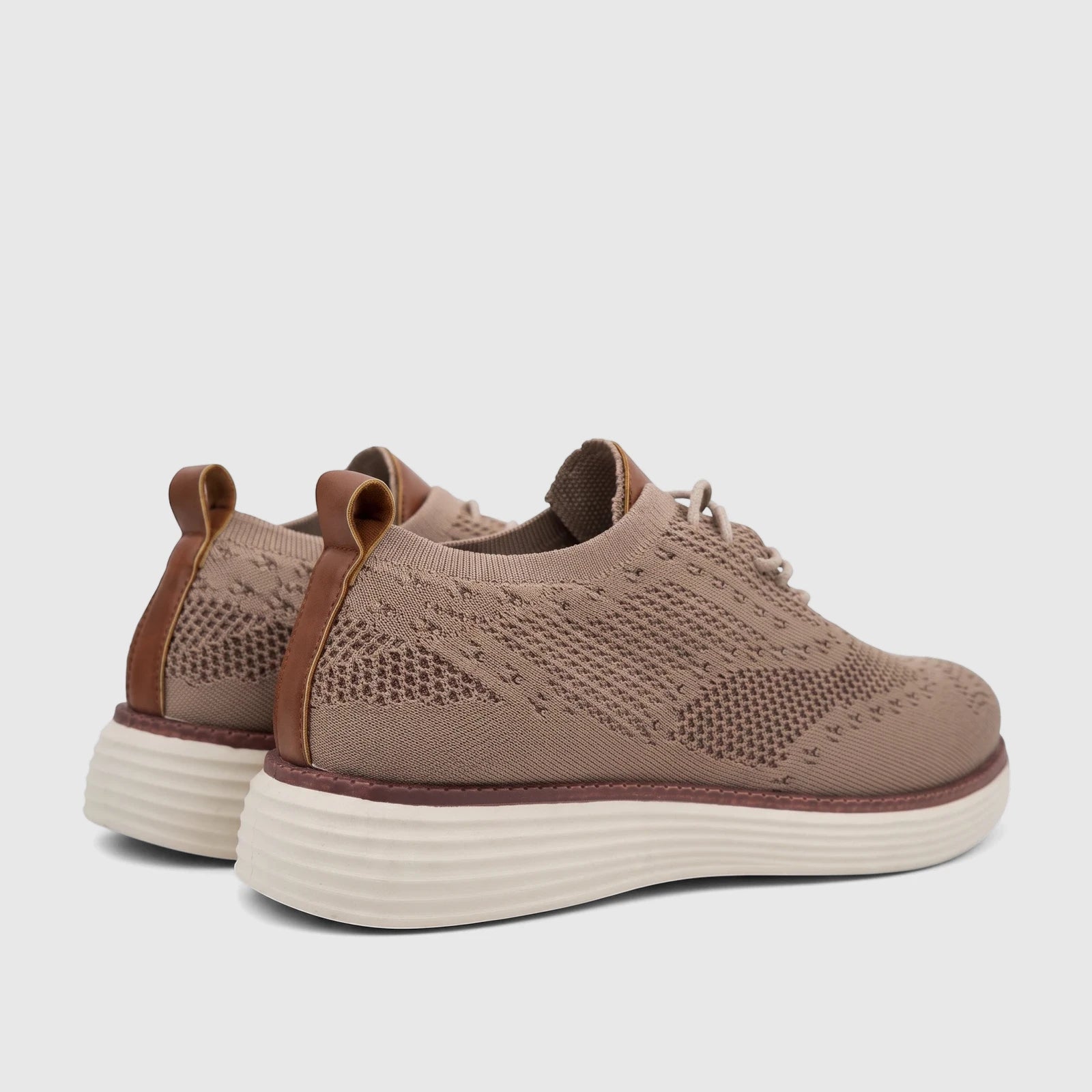 Pair of beige HP Men's Comfort Sneaker Styling HPM01029 flyknit sneakers. Features a knit upper, white sole, and brown