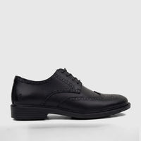 Black leather men's dress lace-up brogue shoe with detailed perforations and a stacked heel, shown in a side view.