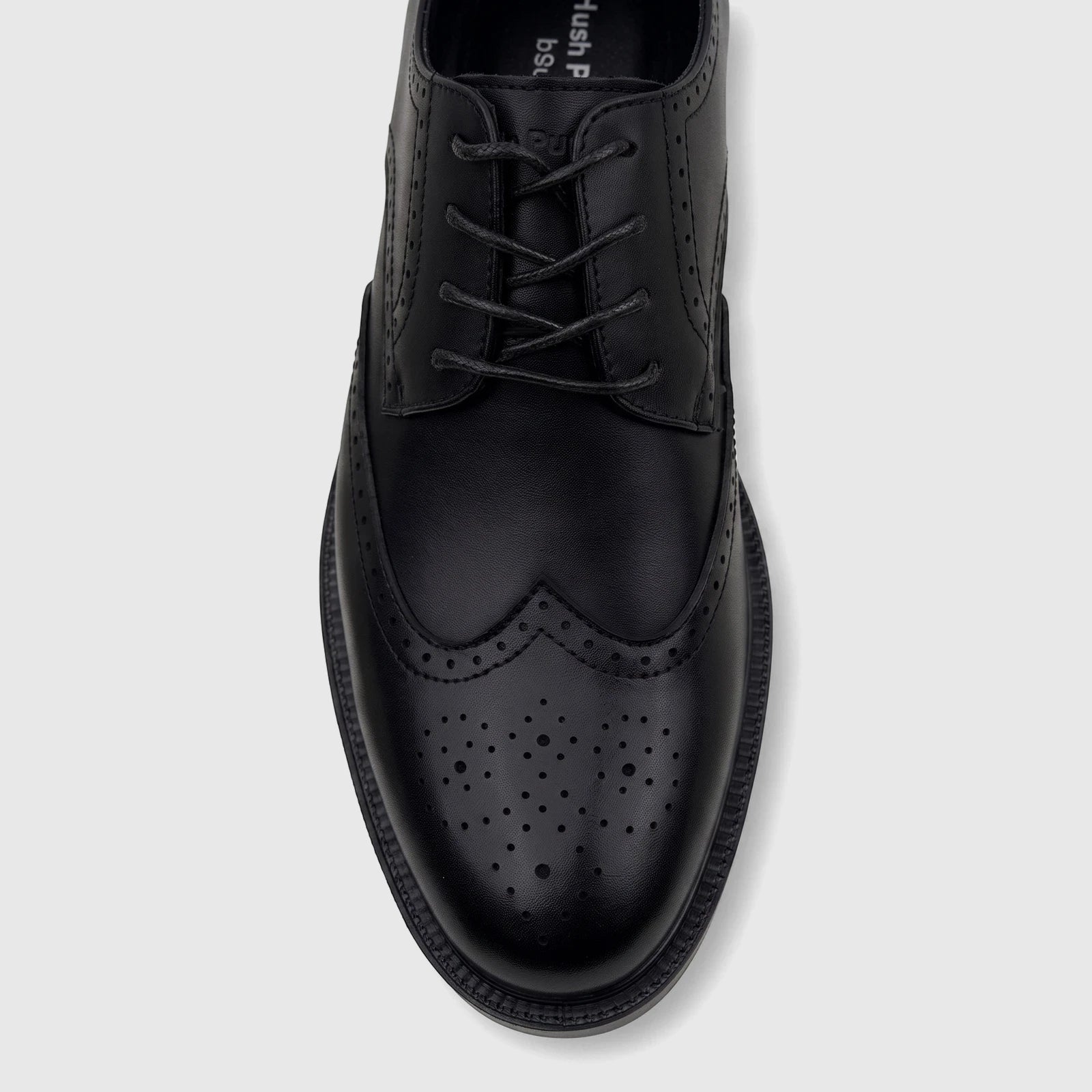 Black leather men's dress lace-up brogue shoe, Alaric HPM01025, with perforated details, visible from a top-down perspective.