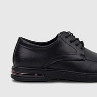 Black leather lace-up men's dress shoe from HP, featuring a subtle logo on the heel and an air pocket sole, viewed from the