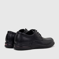 Black leather HP Men's Dress Lace Up Patrick shoes, viewed from a back-side angle, highlighting the design details and sole.