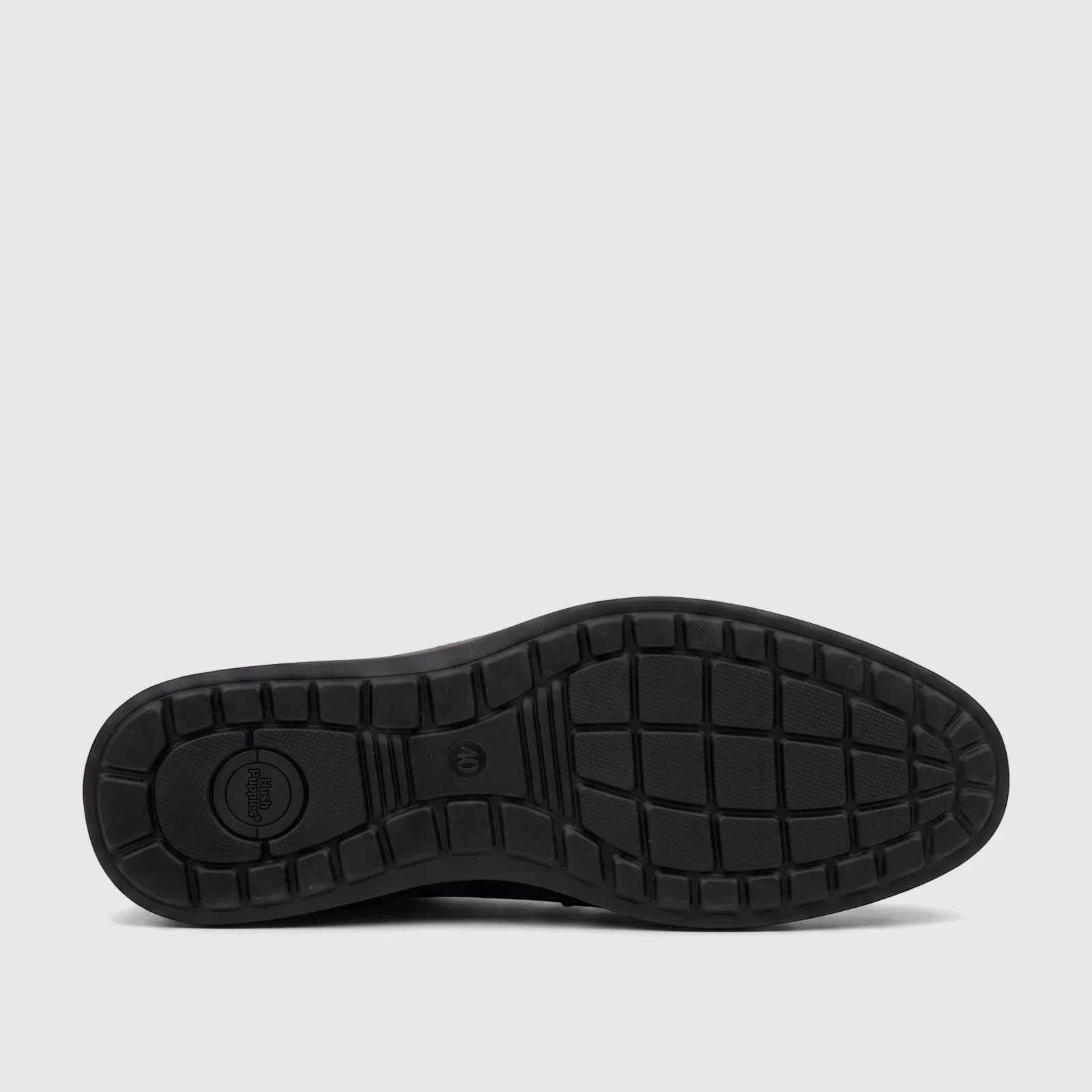 HP Men's Dress Lace Up Patrick HPM01021 black shoe sole, viewed from beneath, showcasing its textured grip and Hush Puppies