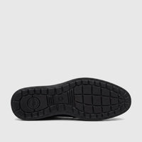 HP Men's Dress Lace Up Patrick HPM01021 black shoe sole, viewed from beneath, showcasing its textured grip and Hush Puppies