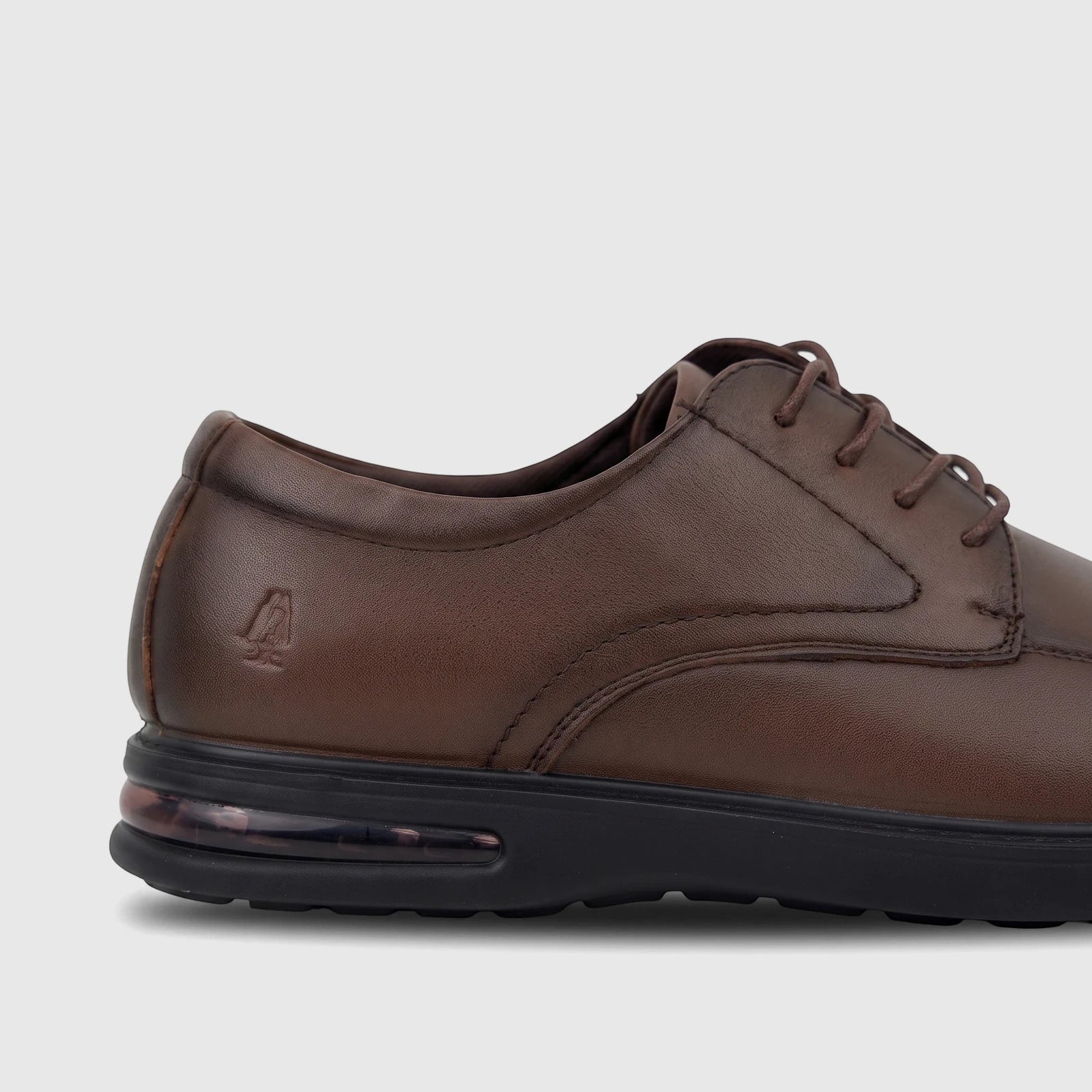 HP Men's Dress Lace Up Patrick brown leather shoe, side view showing the laces, heel detail, and air unit.