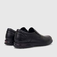 Black HP Men's Dress Slip On Julian HPM01022 shoes, showcasing their leather texture and distinctive sole details from a