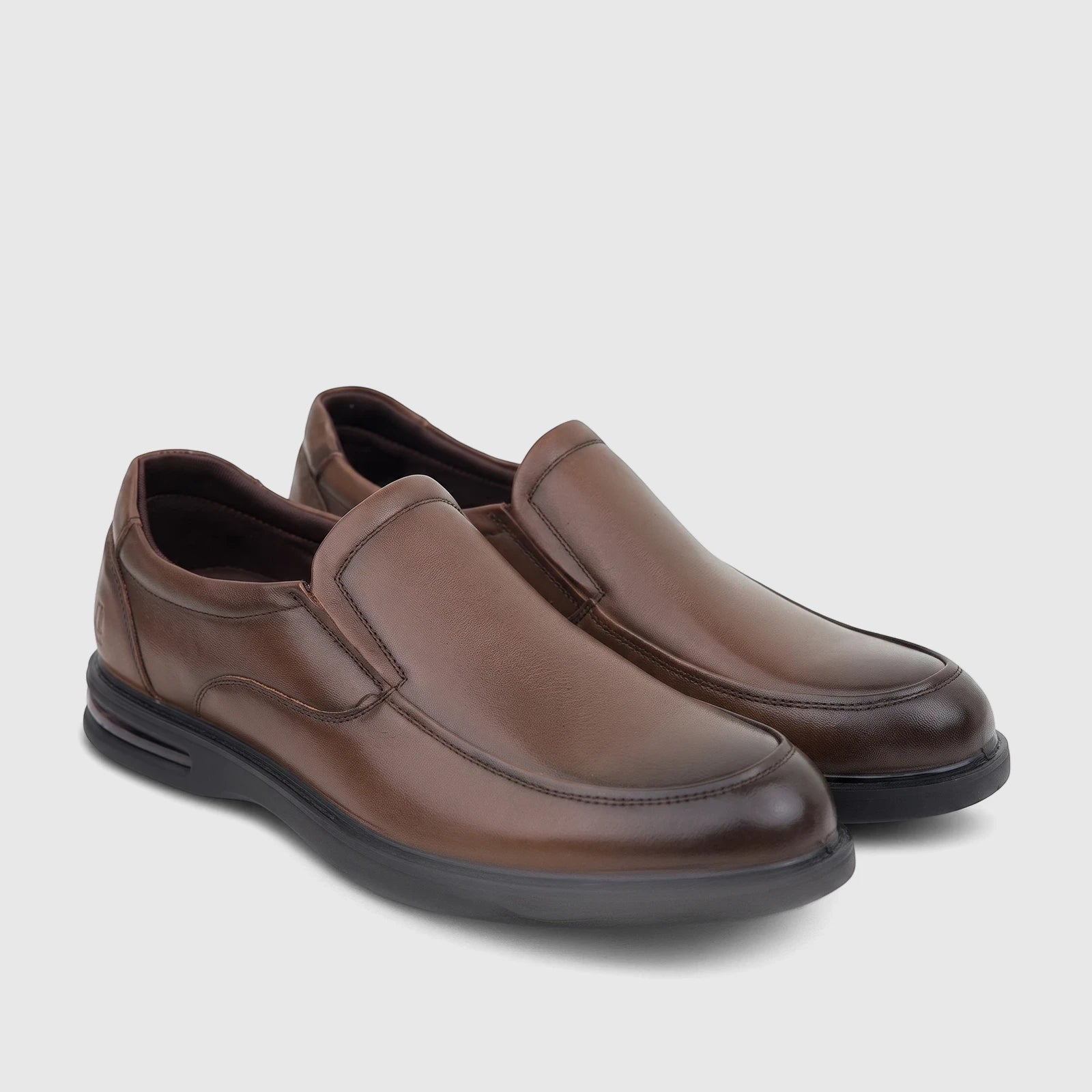 A pair of HP Men's Julian HPM01022 brown leather slip-on dress shoes, featuring a sleek design and comfortable fit.