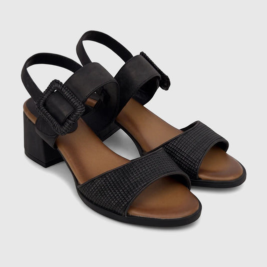 Black Hush Puppies Soft Style Hetty comfort block heel sandal with woven strap and adjustable buckle, side view.