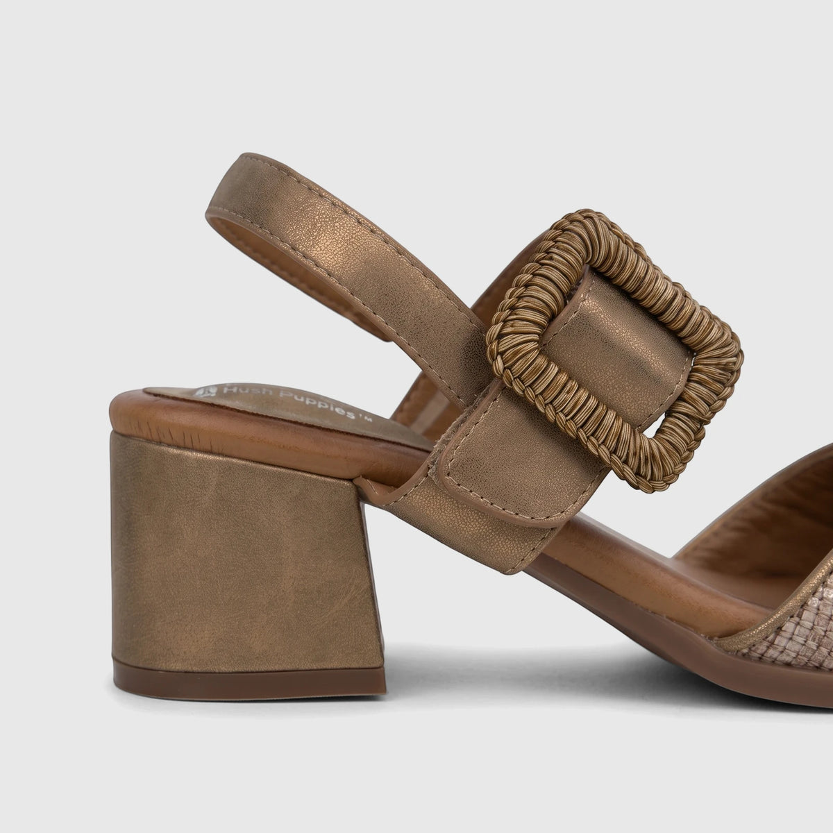 Bronze HP Soft Style Hetty comfort block heel sandal with a woven buckle and metallic finish, seen from the side.
