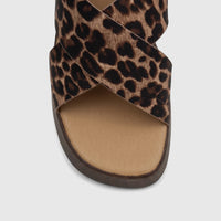HP Soft Style Jemma Leopard print ladies comfort wedge sandal, showing the criss-cross straps and tan insole from a front