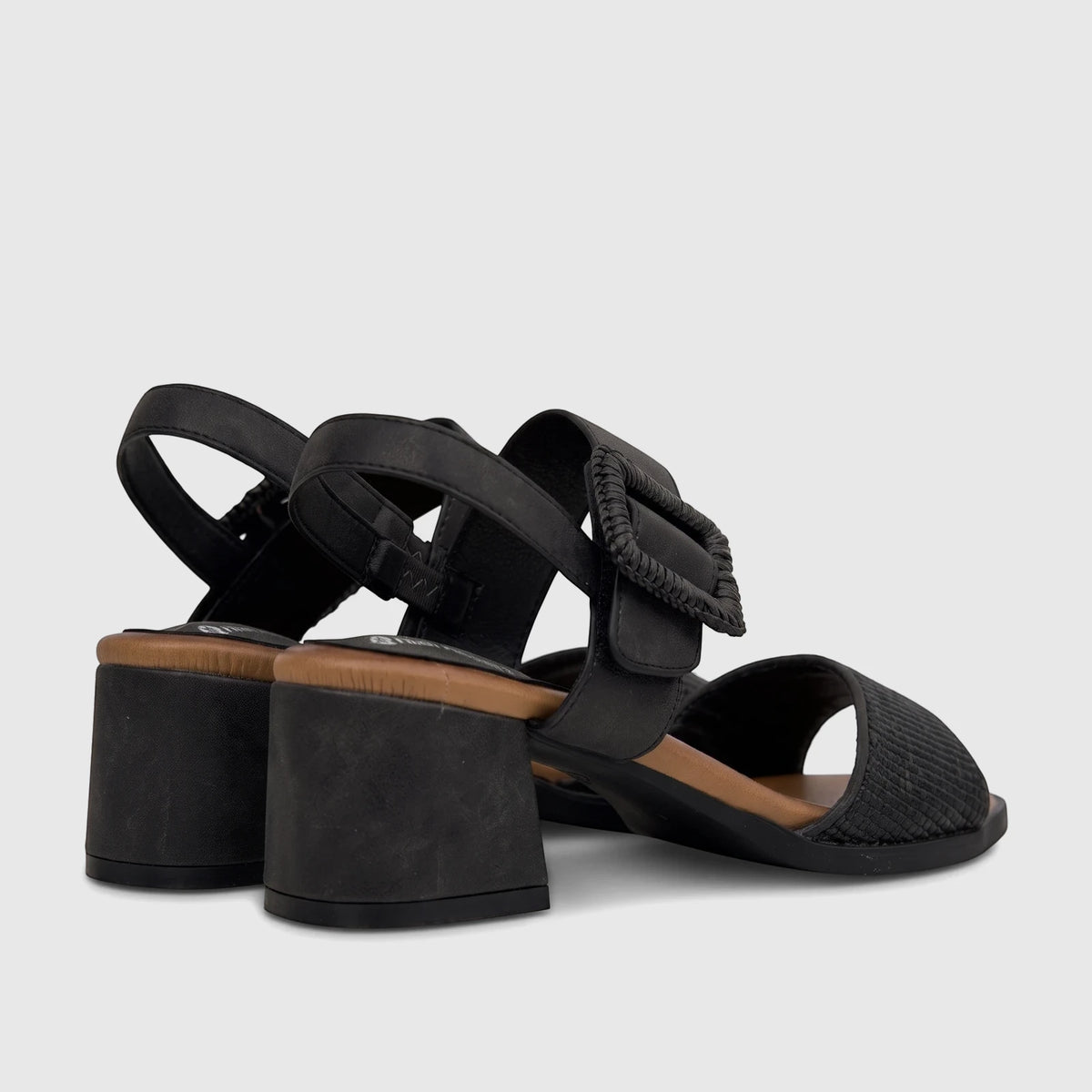 HP Soft Style Ladies Comfort Block Heel Sandals in black, featuring a textured buckle and a brown insole, viewed from the