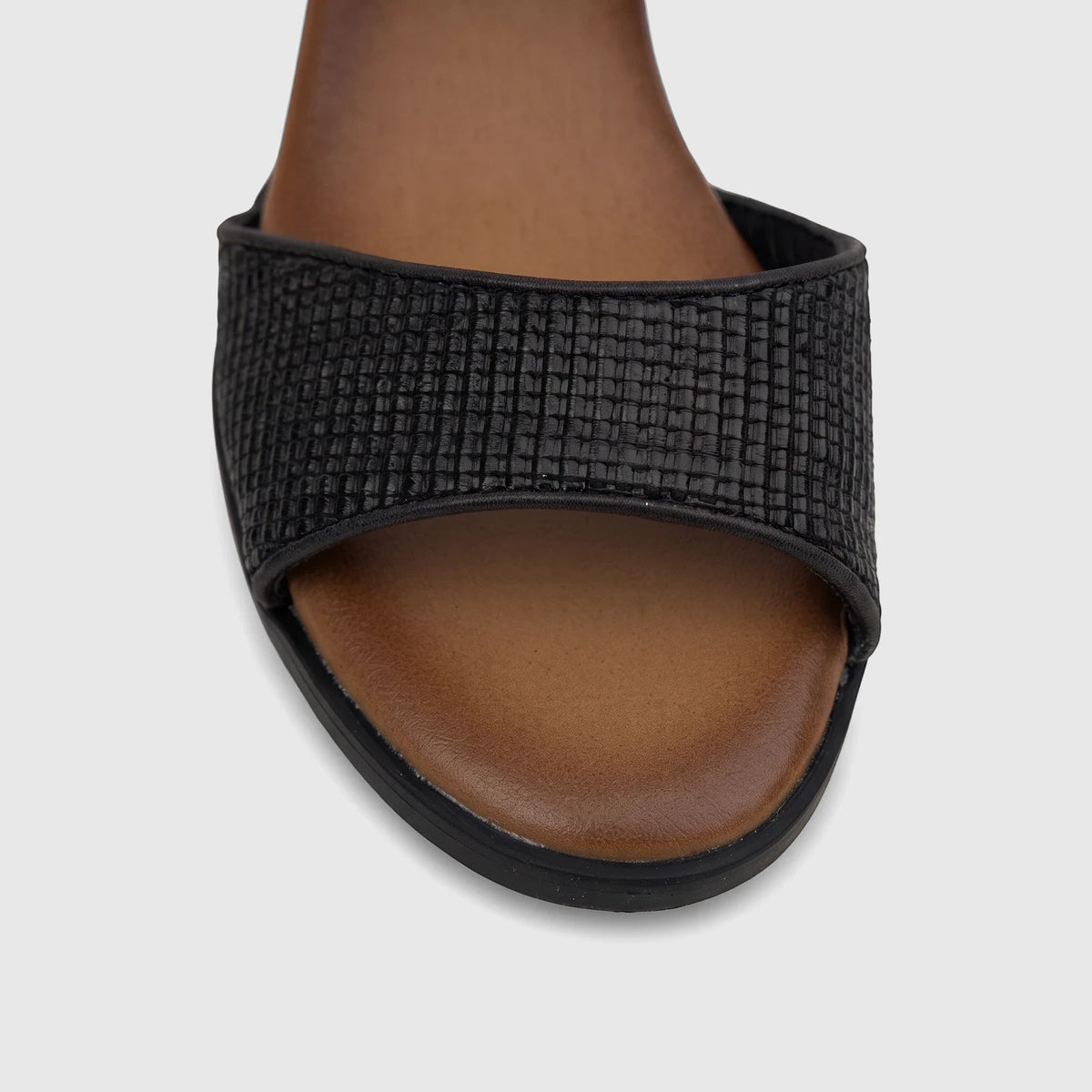 Close-up of an HP Soft Style Ladies Comfort Block Heel Sandal in Hetty Black, featuring a textured strap and a comfortable