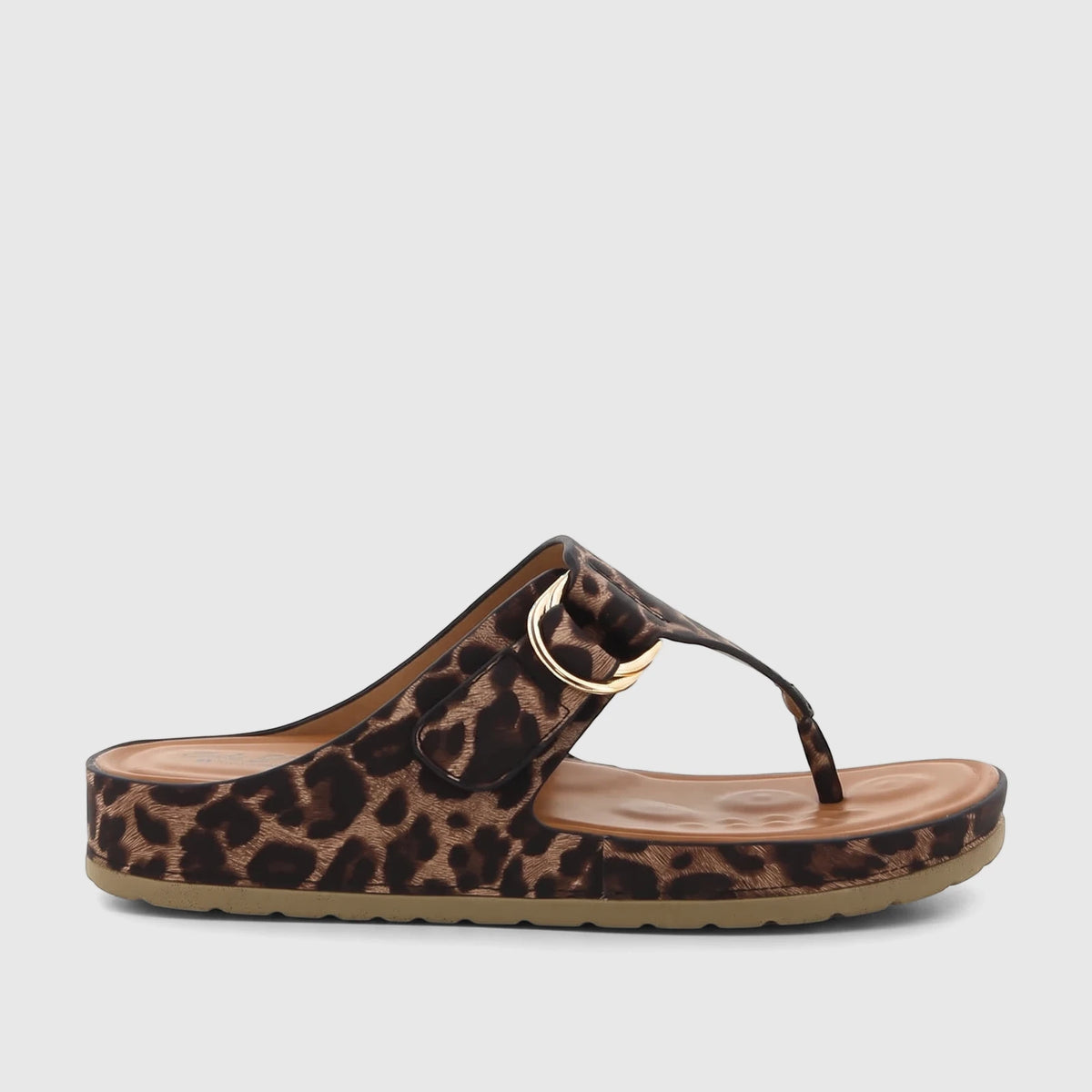 Leopard print ladies comfort sandal with a gold-tone O-ring buckle, featuring a brown insole and tan sole, shown from a side