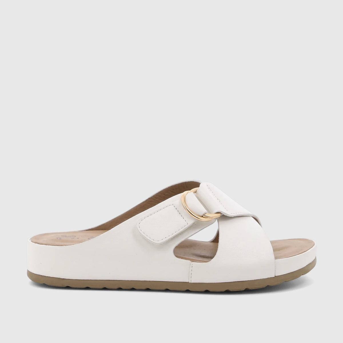 HP Soft Style Tanika white ladies' comfort sandal with two straps and a gold buckle, shown from a side view.