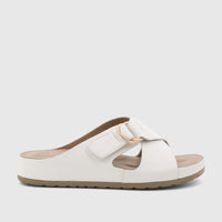 HP Soft Style Tanika white ladies' comfort sandal with two straps and a gold buckle, shown from a side view.