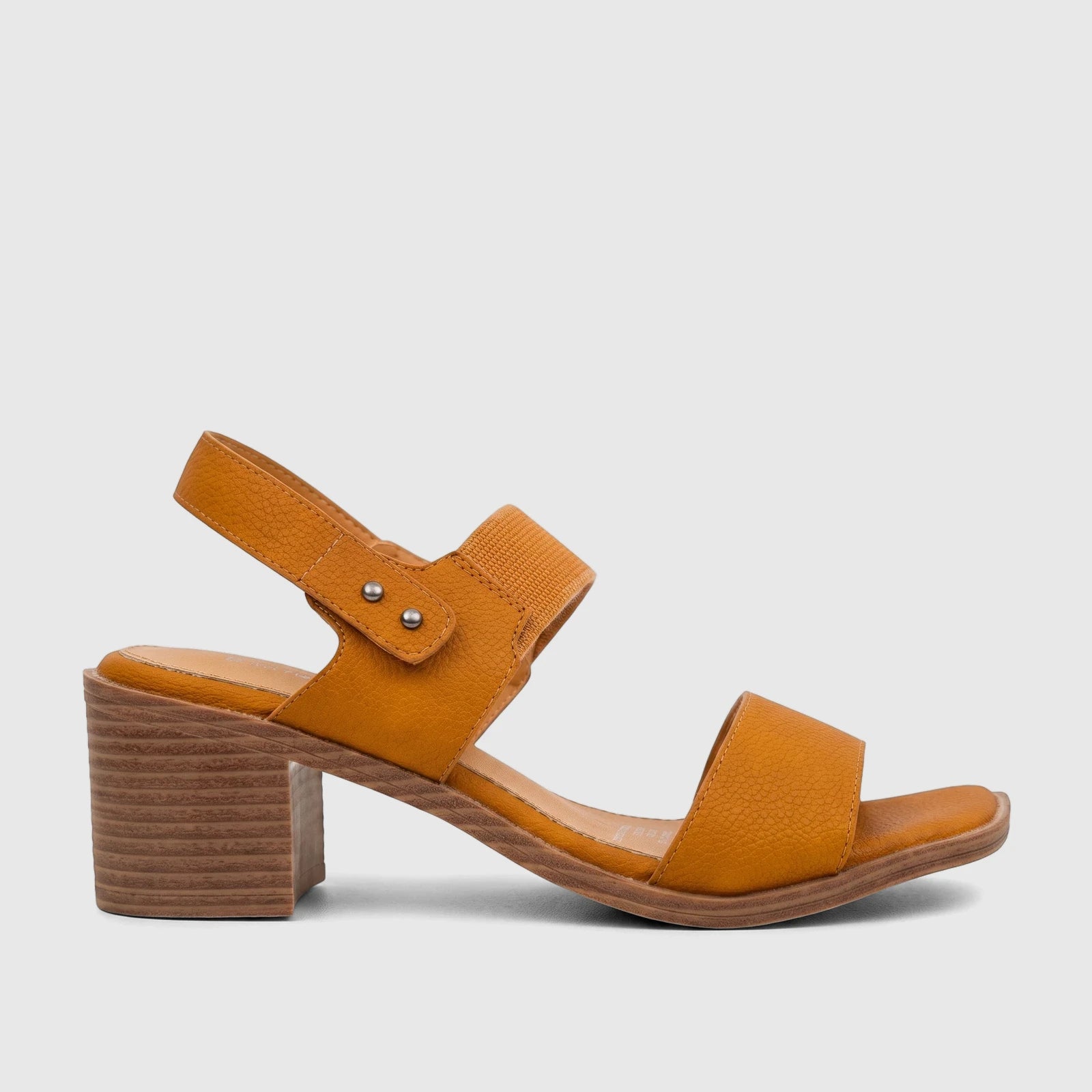 Hush Puppies Abrianna burnt orange block heel sandal with textured straps and a wood-stacked heel, viewed from the side.
