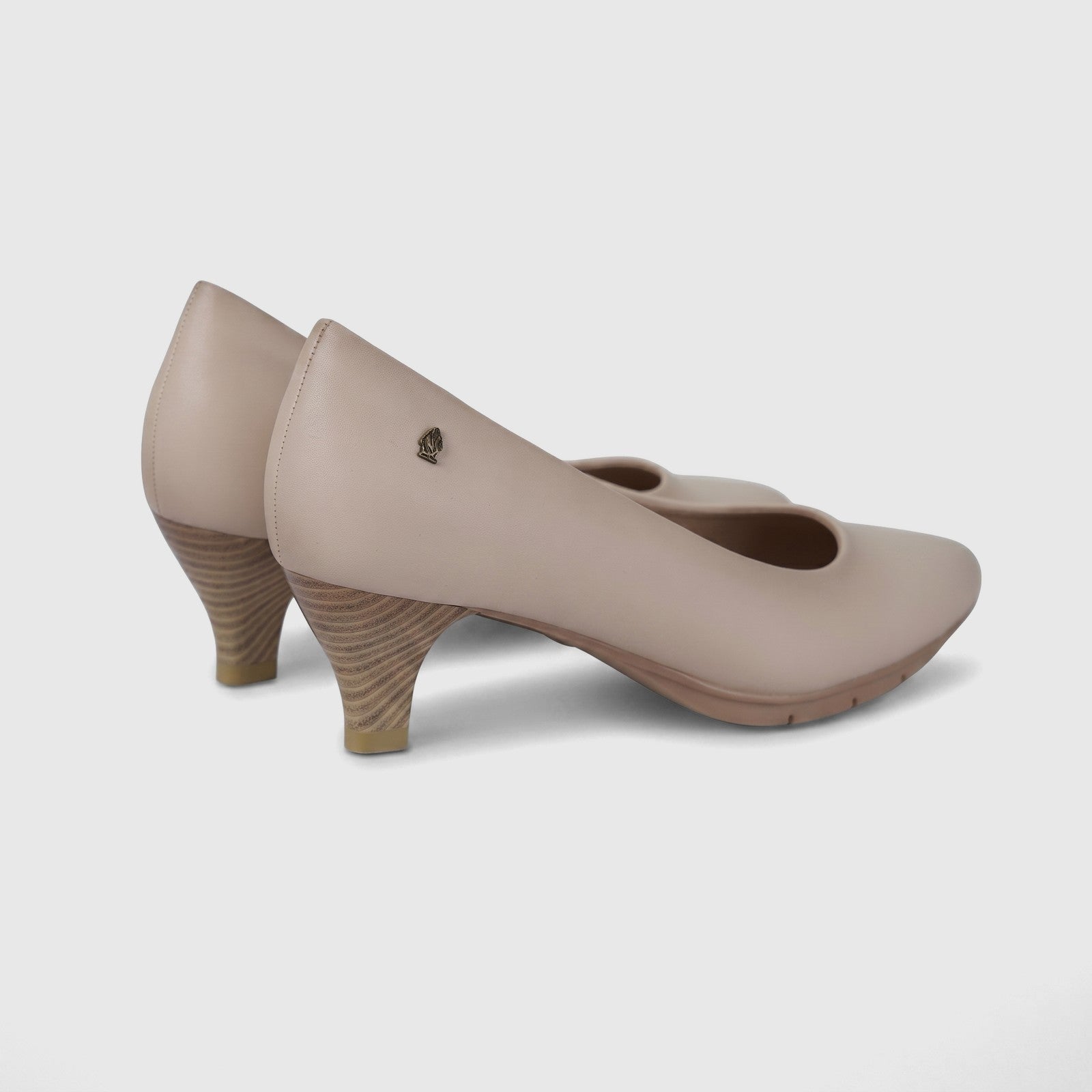 Hush Puppies Soft Style Ladies Comfort Court Aradia nude court shoes, side view with smooth upper and mid block heel.