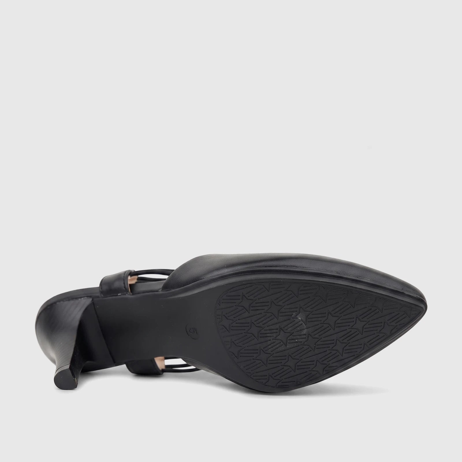 Black Hush Puppies Soft Style ladies court shoe with a pointed toe and high heel, featuring a star-patterned sole, viewed