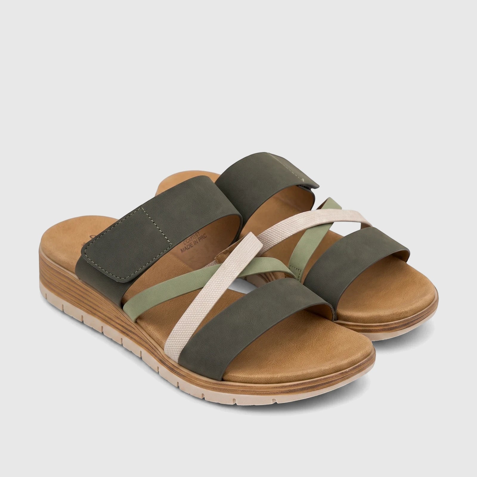 Hush Puppies Soft Style Ladies Comfort Sandal Carmen in khaki multi, featuring crisscross straps, a soft footbed, and a