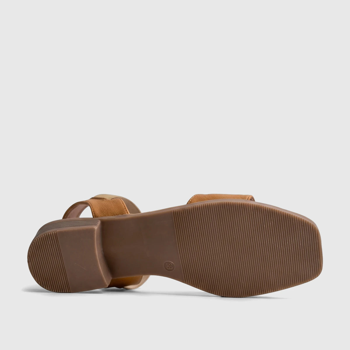 Hush Puppies Soft Style Ladies Comfort Sandal in Harlan Tan, shown from the underside, highlighting the brown ribbed sole